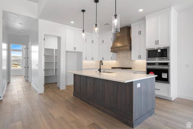 824 S 1690 W, Hurricane, UT 84737 - kitchen featuring stainless steel appliances, a sink, baseboards, white cabinetry, and recessed lighting