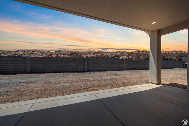 824 S 1690 W, Hurricane, UT 84737 - patio terrace at dusk with a fenced backyard and a patio area