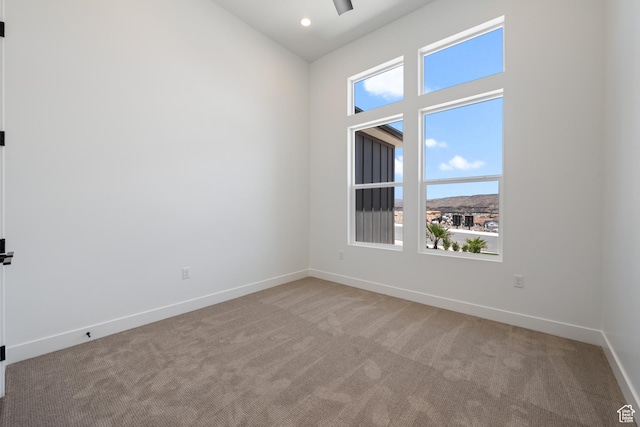 824 S 1690 W, Hurricane, UT 84737 - unfurnished room featuring carpet flooring, a high ceiling, and recessed lighting