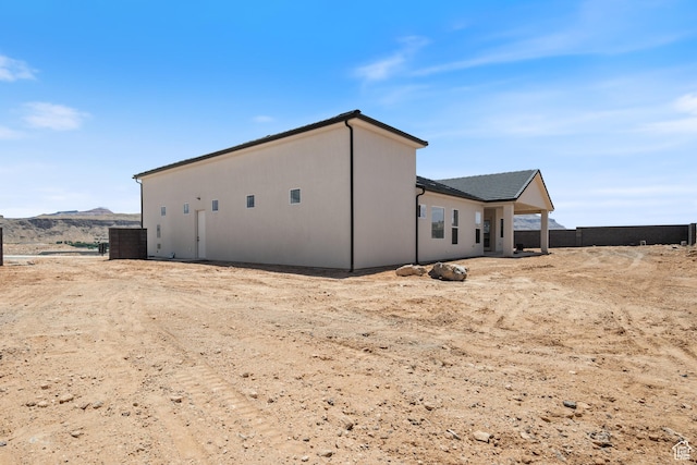 824 S 1690 W, Hurricane, UT 84737 - rear view of property featuring a mountain view