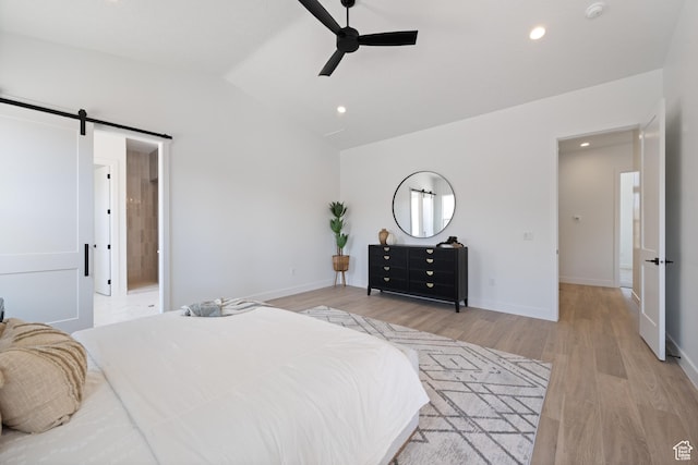 824 S 1690 W, Hurricane, UT 84737 - bedroom featuring vaulted ceiling, a barn door, wood finished floors, recessed lighting, and ceiling fan