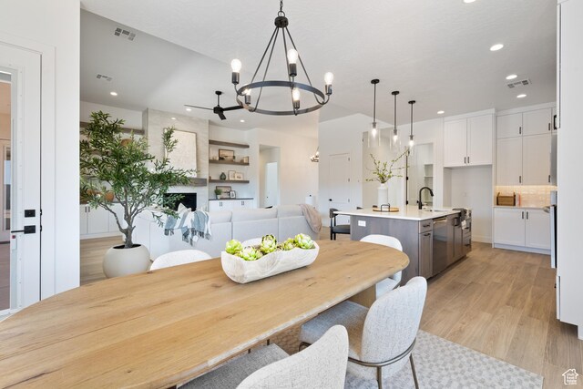 824 S 1690 W, Hurricane, UT 84737 - dining space with a chandelier, light wood-style floors, and recessed lighting