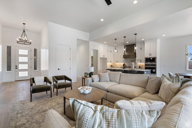 824 S 1690 W, Hurricane, UT 84737 - living room with a chandelier, light wood finished floors, and recessed lighting