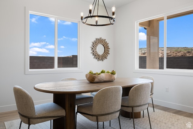 824 S 1690 W, Hurricane, UT 84737 - dining space with a chandelier and light wood-style flooring