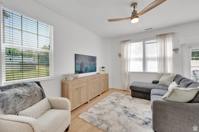 14284 S Daisyfield Dr E, Draper, UT 84020 - living area featuring ceiling fan and light wood-style flooring