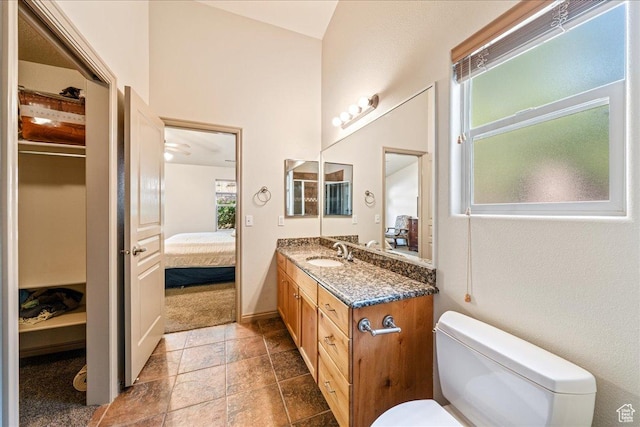 1173 W Snow Canyon Pkwy Unit 30, St George, UT 84770 - bathroom featuring connected bathroom, vanity, toilet, and a closet