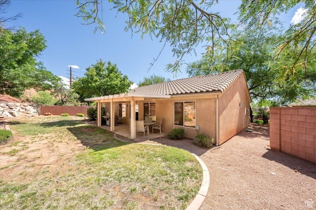 1173 W Snow Canyon Pkwy Unit 30, St George, UT 84770 - rear view of house featuring a patio, a tiled roof, and stucco siding