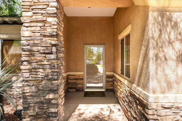 1173 W Snow Canyon Pkwy Unit 30, St George, UT 84770 - doorway to property with stucco siding and stone siding