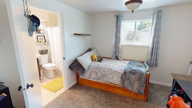 540 E 990 N, Pleasant Grove, UT 84062 - bedroom featuring ensuite bath and tile patterned flooring