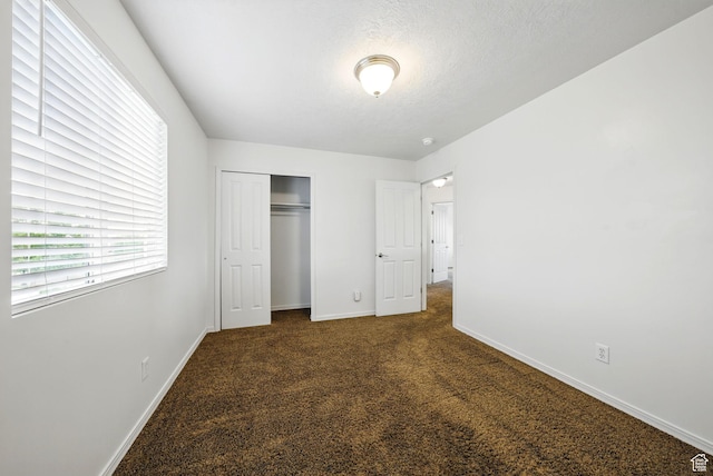 13708 S Manas Ct, Herriman, UT 84096 - unfurnished bedroom featuring carpet floors, baseboards, and a closet