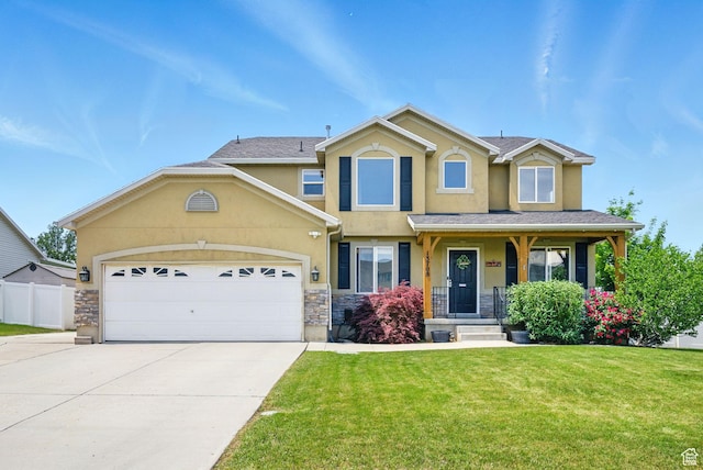 13708 S Manas Ct, Herriman, UT 84096 - view of front of house featuring stucco siding, driveway, stone siding, and a garage