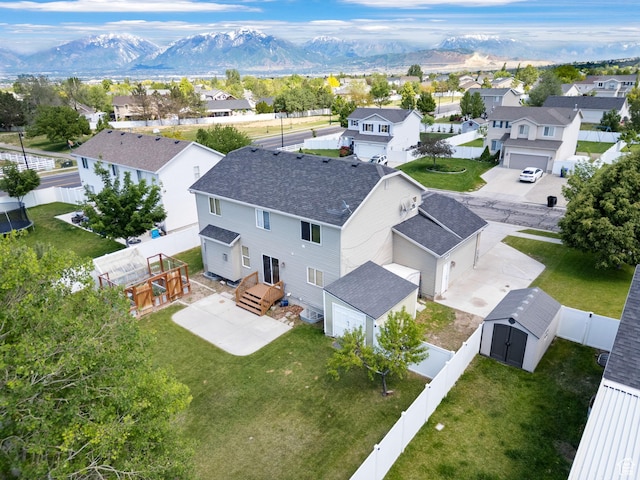13708 S Manas Ct, Herriman, UT 84096 - aerial perspective of suburban area featuring a mountainous background