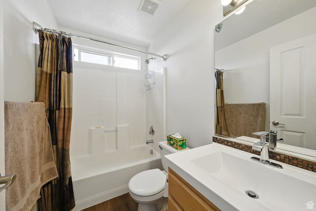 13708 S Manas Ct, Herriman, UT 84096 - full bathroom featuring shower / bath combo with shower curtain, vanity, toilet, and wood finished floors