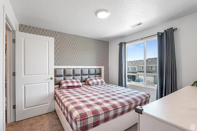 3970 W Cool Spring Ave, Lehi, UT 84043 - bedroom with light colored carpet, wallpapered walls, and a textured ceiling