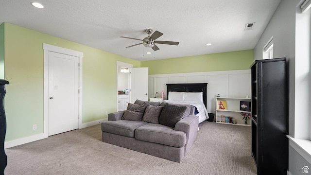 225 W 1390 N, Orem, UT 84057 - carpeted bedroom with recessed lighting, a fireplace, a ceiling fan, connected bathroom, and a textured ceiling