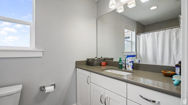 225 W 1390 N, Orem, UT 84057 - full bathroom with toilet, vanity, baseboards, recessed lighting, and a shower with curtain
