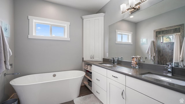 225 W 1390 N, Orem, UT 84057 - bathroom featuring double vanity and a soaking tub