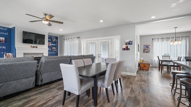 225 W 1390 N, Orem, UT 84057 - dining room featuring dark wood-style flooring, ceiling fan, a large fireplace, a chandelier, and recessed lighting