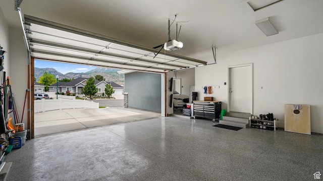 225 W 1390 N, Orem, UT 84057 - garage featuring a garage door opener and a mountain view
