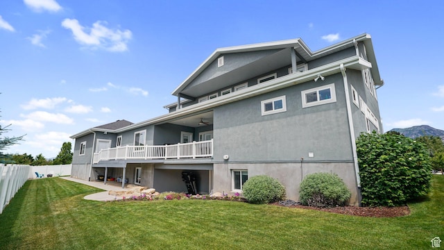 225 W 1390 N, Orem, UT 84057 - back of house featuring stucco siding, ceiling fan, and a wooden deck