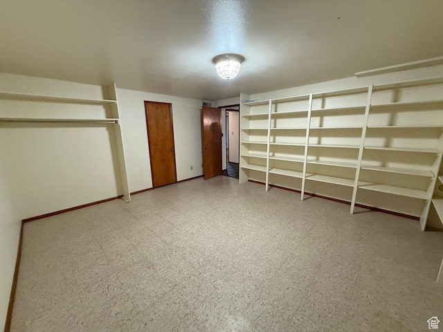 1144 W Bloomington Dr S, St George, UT 84790 - unfurnished bedroom featuring light flooring, two closets, and baseboards
