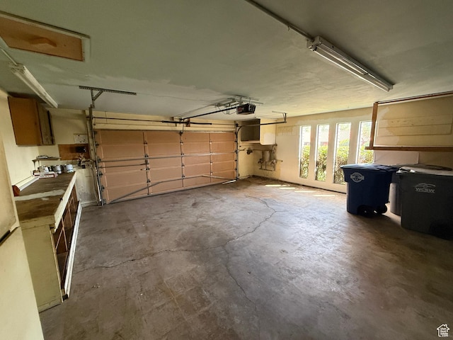 1144 W Bloomington Dr S, St George, UT 84790 - garage featuring a garage door opener