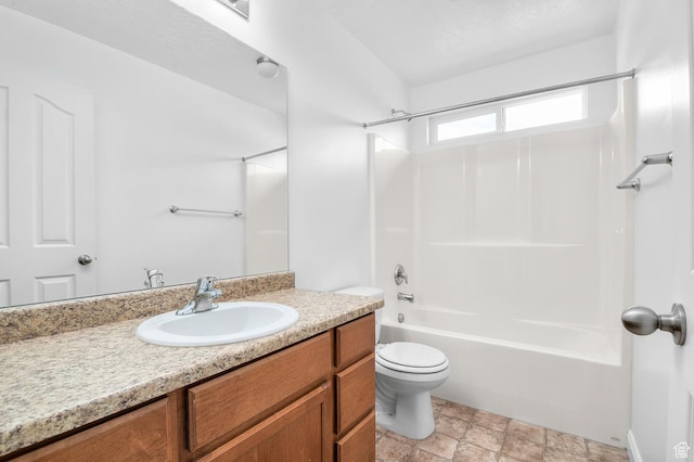 4699 W Greensand Dr S, West Jordan, UT 84084 - full bath featuring vanity,  shower combination, toilet, and stone finish floors
