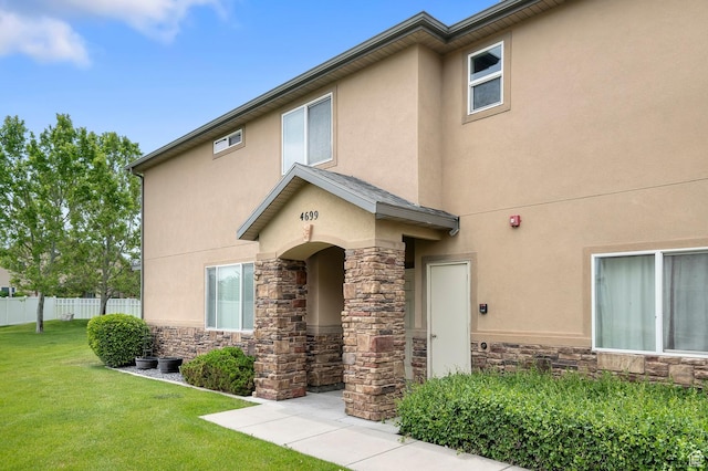4699 W Greensand Dr S, West Jordan, UT 84084 - view of front of property with stone siding and stucco siding