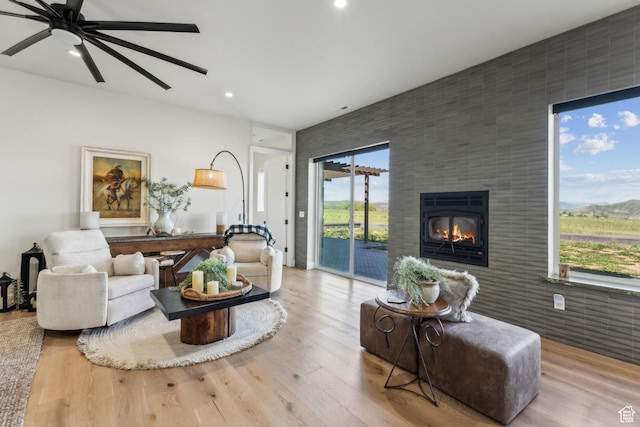 2711 S 500 E, Francis, UT 84036 - living area featuring a large fireplace, a ceiling fan, recessed lighting, and wood finished floors