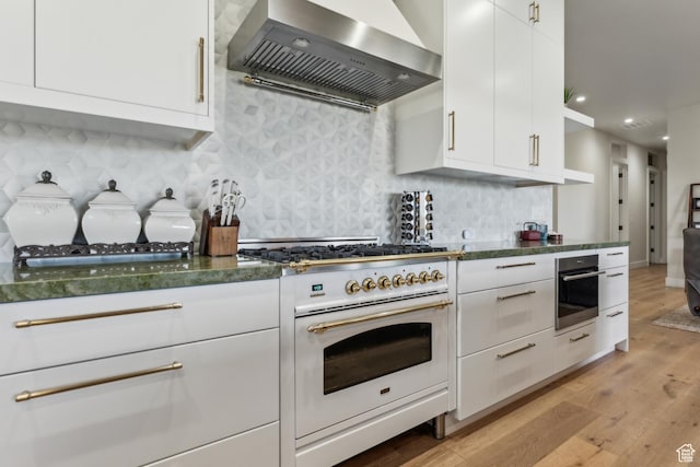 2711 S 500 E, Francis, UT 84036 - kitchen with ventilation hood, white range, oven, light wood-style flooring, and white cabinets