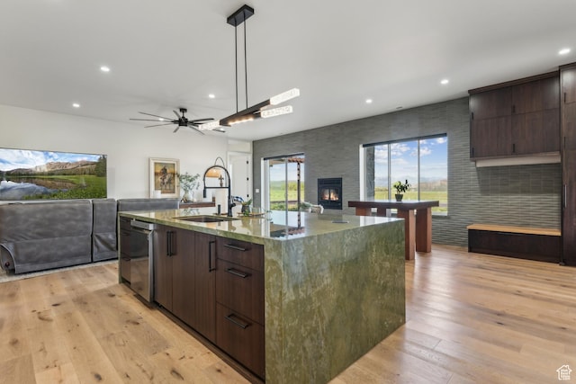 2711 S 500 E, Francis, UT 84036 - kitchen featuring open floor plan, a sink, dark brown cabinetry, recessed lighting, and stainless steel dishwasher