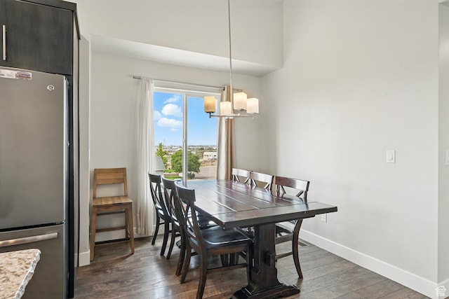 48 S Cimarron Cir, Cedar City, UT 84720 - dining area with dark wood-style flooring, a chandelier, and baseboards