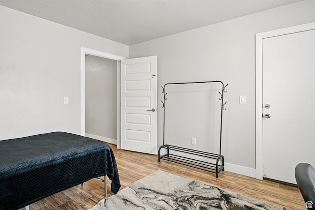48 S Cimarron Cir, Cedar City, UT 84720 - bedroom featuring light wood finished floors and baseboards
