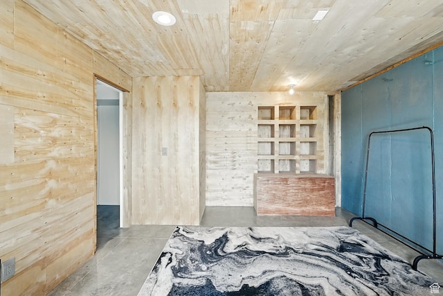 48 S Cimarron Cir, Cedar City, UT 84720 - unfurnished bedroom featuring concrete flooring, wooden ceiling, and wood walls