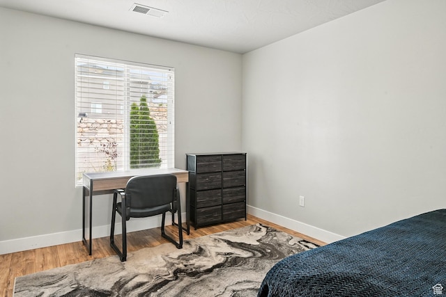 48 S Cimarron Cir, Cedar City, UT 84720 - bedroom with light wood finished floors, baseboards, and an office area