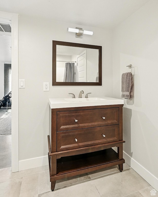 48 S Cimarron Cir, Cedar City, UT 84720 - full bath with vanity, baseboards, and tile patterned flooring