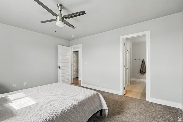 48 S Cimarron Cir, Cedar City, UT 84720 - bedroom with baseboards, carpet floors, a ceiling fan, and ensuite bath