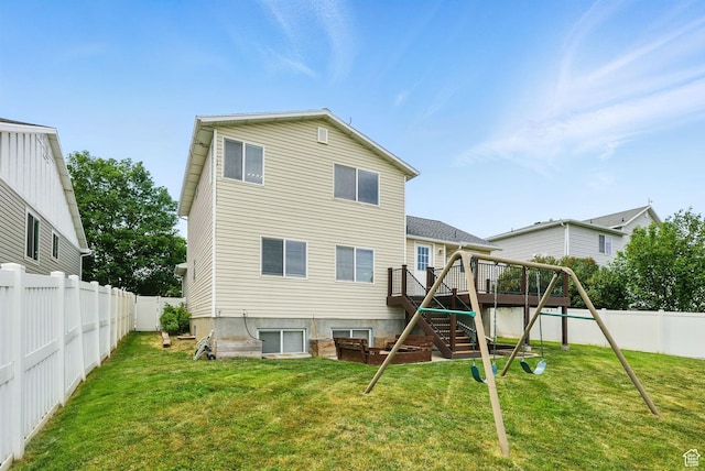 1826 N 2600 W, Lehi, UT 84043 - back of house with a playground, stairs, and a wooden deck