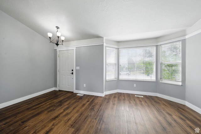 1826 N 2600 W, Lehi, UT 84043 - foyer with a chandelier, dark wood-style flooring, and baseboards