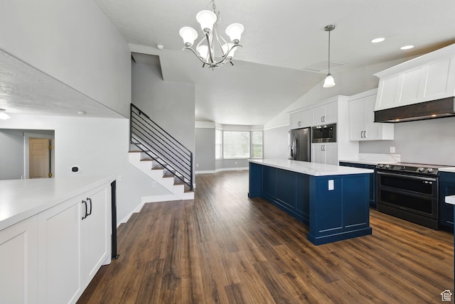 1826 N 2600 W, Lehi, UT 84043 - kitchen with stainless steel appliances, lofted ceiling, light countertops, blue cabinets, and a center island