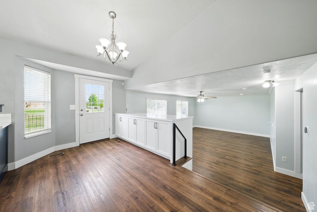1826 N 2600 W, Lehi, UT 84043 - entryway with a chandelier, plenty of natural light, dark wood-style floors, baseboards, and lofted ceiling
