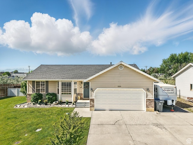 1029 W 500 N, Pleasant Grove, UT 84062 - view of front of home featuring brick siding, driveway, an attached garage, and roof with shingles