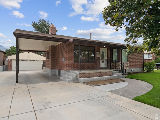 9751 S Garnet Dr, Sandy, UT 84094 - ranch-style house with an outbuilding, brick siding, a chimney, and a garage