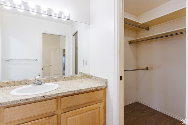 710 S Indian Hills Dr # 64, St George, UT 84770 - bathroom with vanity and wood finished floors