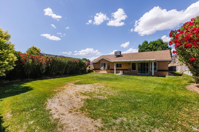 710 S Indian Hills Dr # 64, St George, UT 84770 - view of green lawn with central AC