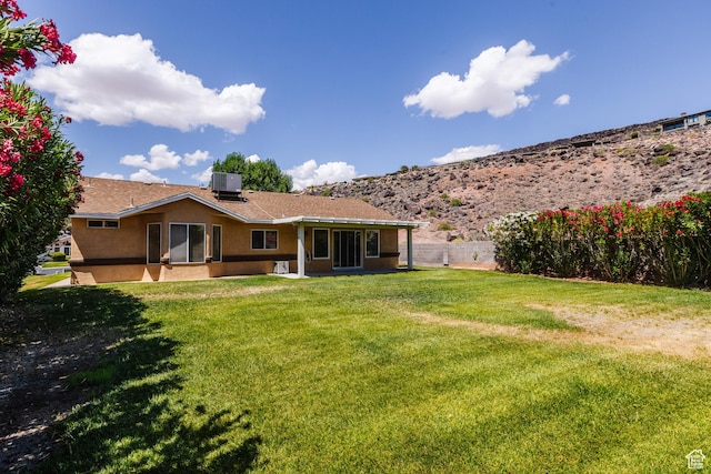 710 S Indian Hills Dr # 64, St George, UT 84770 - back of property with stucco siding and central AC