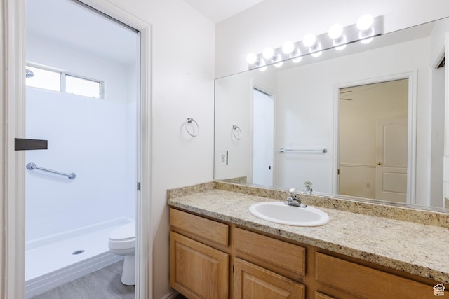 710 S Indian Hills Dr # 64, St George, UT 84770 - bathroom with toilet, vanity, and a shower stall