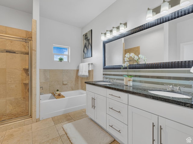 3877 S 1655 W, West Valley City, UT 84119 - full bathroom featuring a garden tub, double vanity, a shower stall, and tile patterned flooring