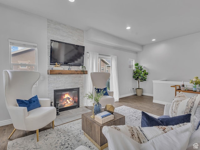 3877 S 1655 W, West Valley City, UT 84119 - living area featuring a fireplace, wood finished floors, recessed lighting, and baseboards