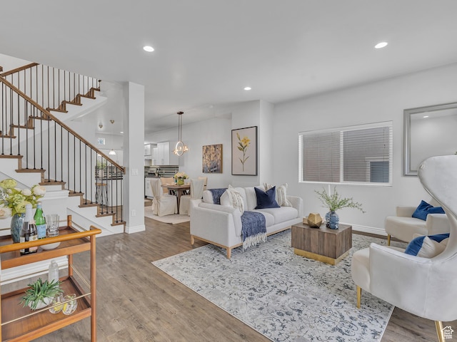 3877 S 1655 W, West Valley City, UT 84119 - living room with wood finished floors, stairway, recessed lighting, and baseboards